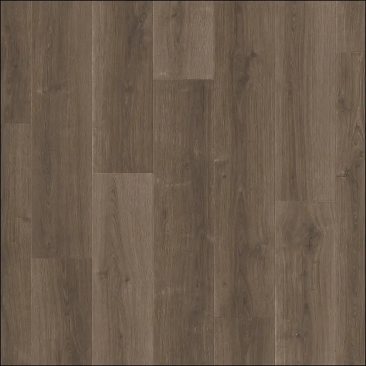 Gray wood-plank laminate flooring with natural grain and tone variations from quickstep capture laminate brushed oak brown