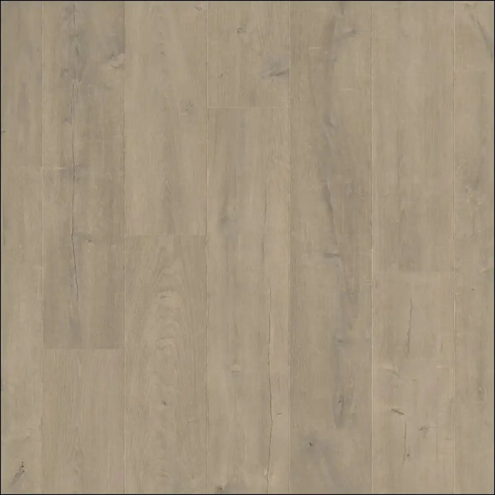 Light gray wood-plank laminate flooring with subtle grain from quickstep capture laminate patina oak brown collection