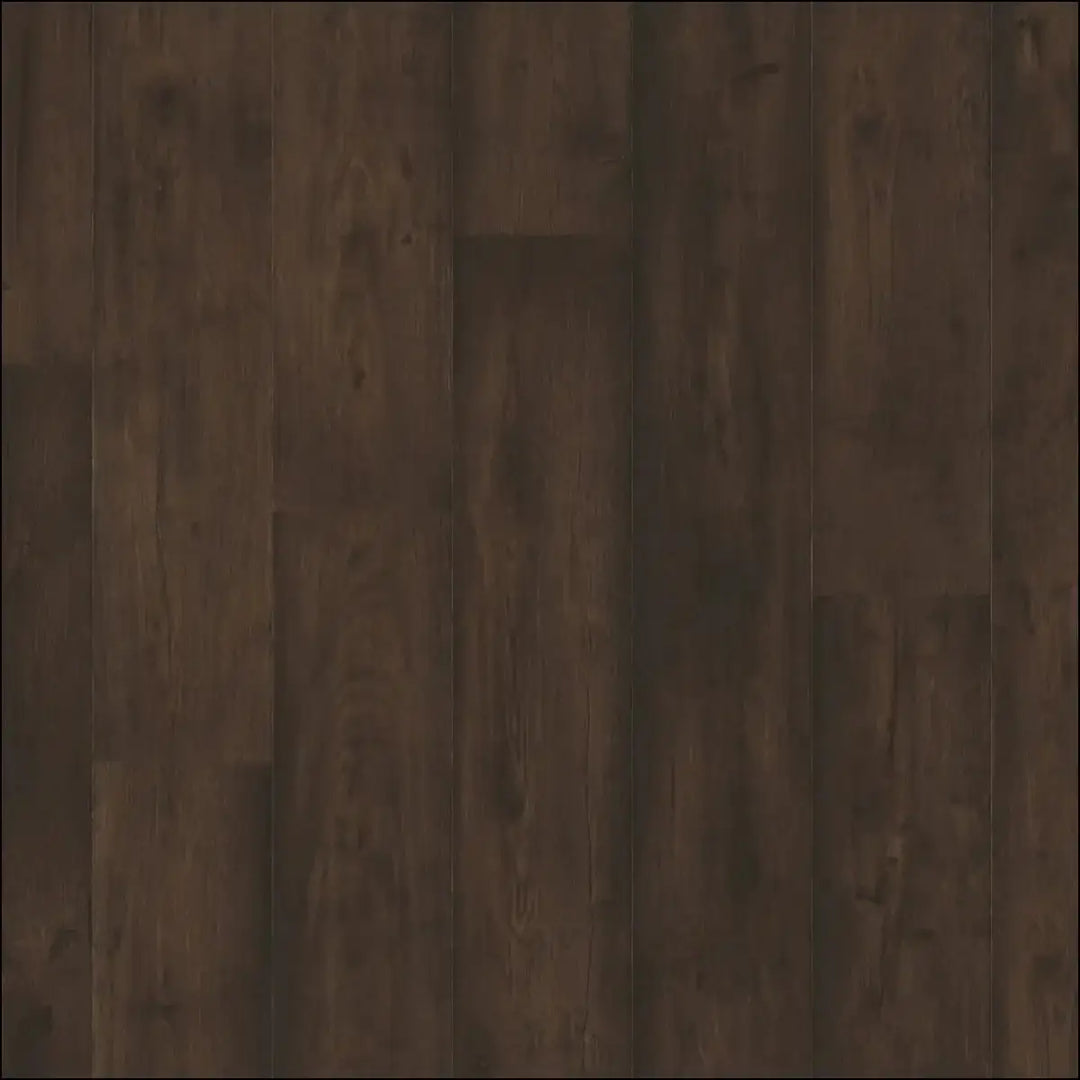 Dark brown oak brown laminate flooring with natural wood grain pattern from quickstep capture waxed collection