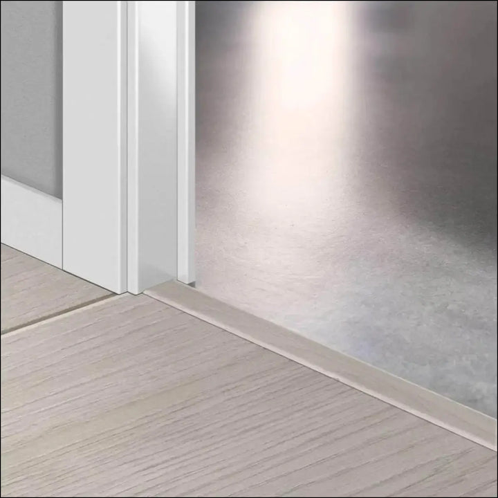 White door threshold with a sleek smooth finish in quickstep classic incizo profile multi use profile design