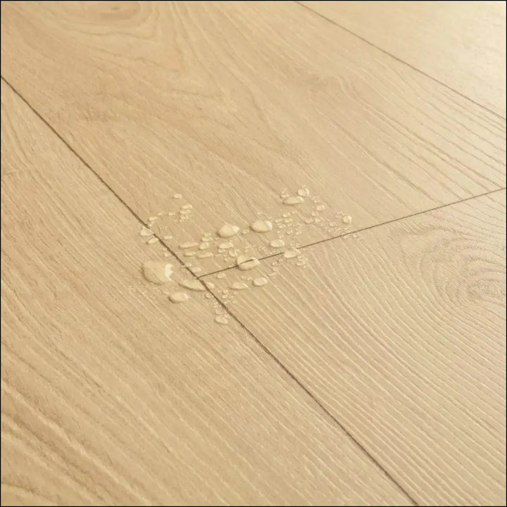 Light-colored quickstep classic laminate flooring desert greige oak greige oak clm5802 with natural grain and subtle knots