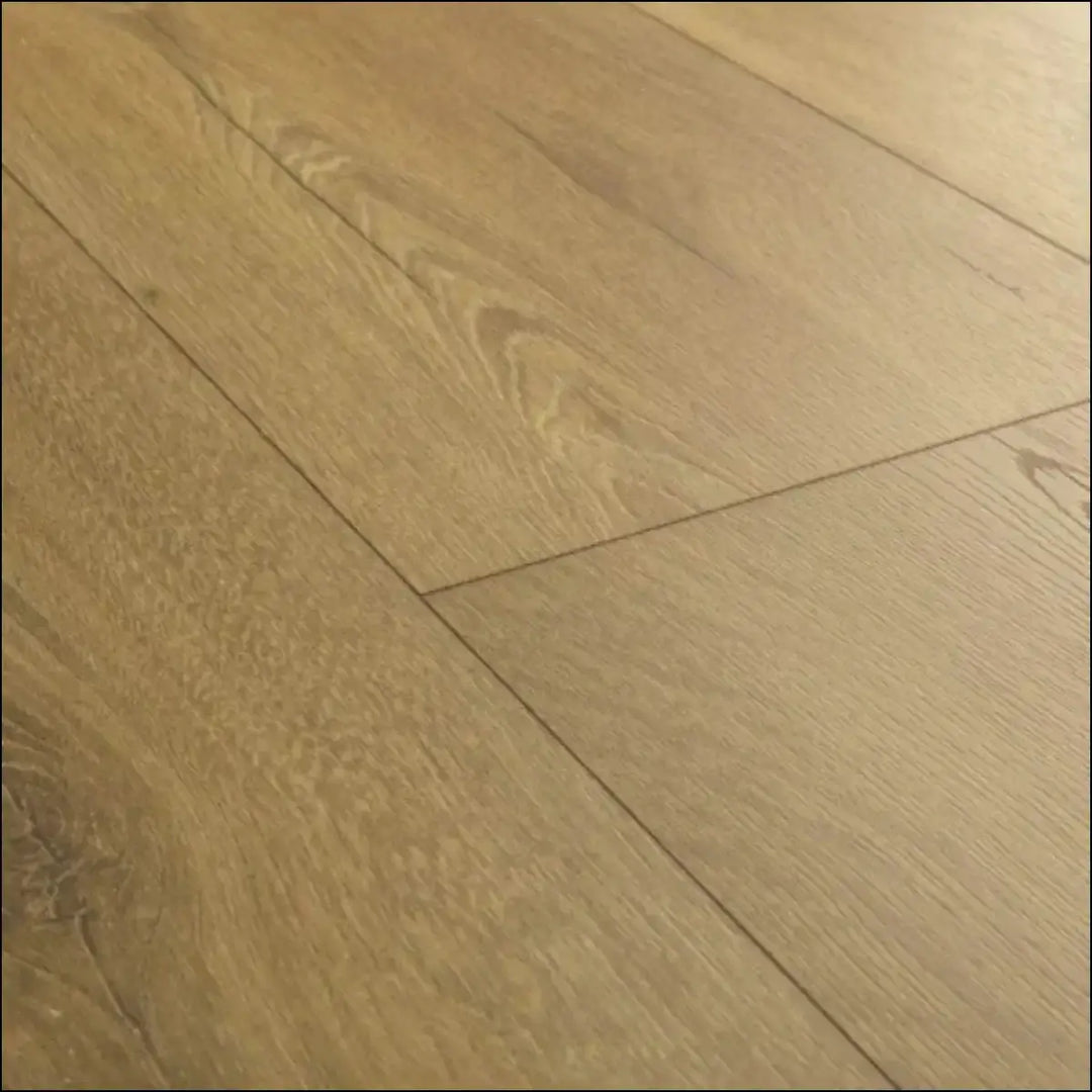Quickstep classic laminate flooring honey brown oak features light brown hardwood planks with natural wood grain pattern clm5792