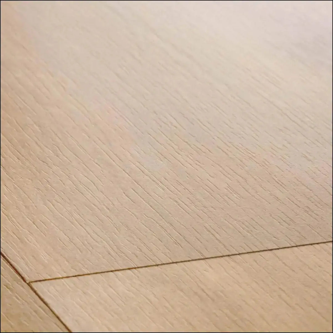 Light oak quickstep classic laminate flooring with smooth natural wood grain in midnight oak natural finish