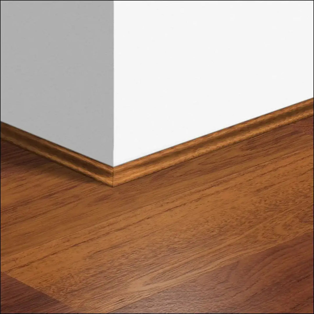 Warm brown wooden quickstep classic baseboard with classic scotia beading and smooth polished finish for quick-step flooring