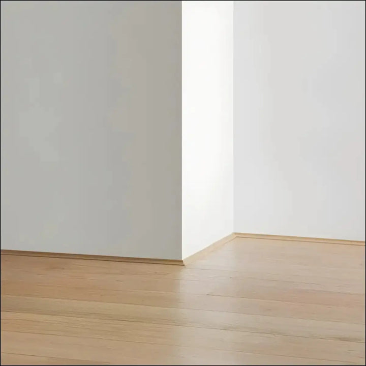 Light-colored wooden quickstep classic flooring with smooth finish and subtle grain featuring classic scotia beading