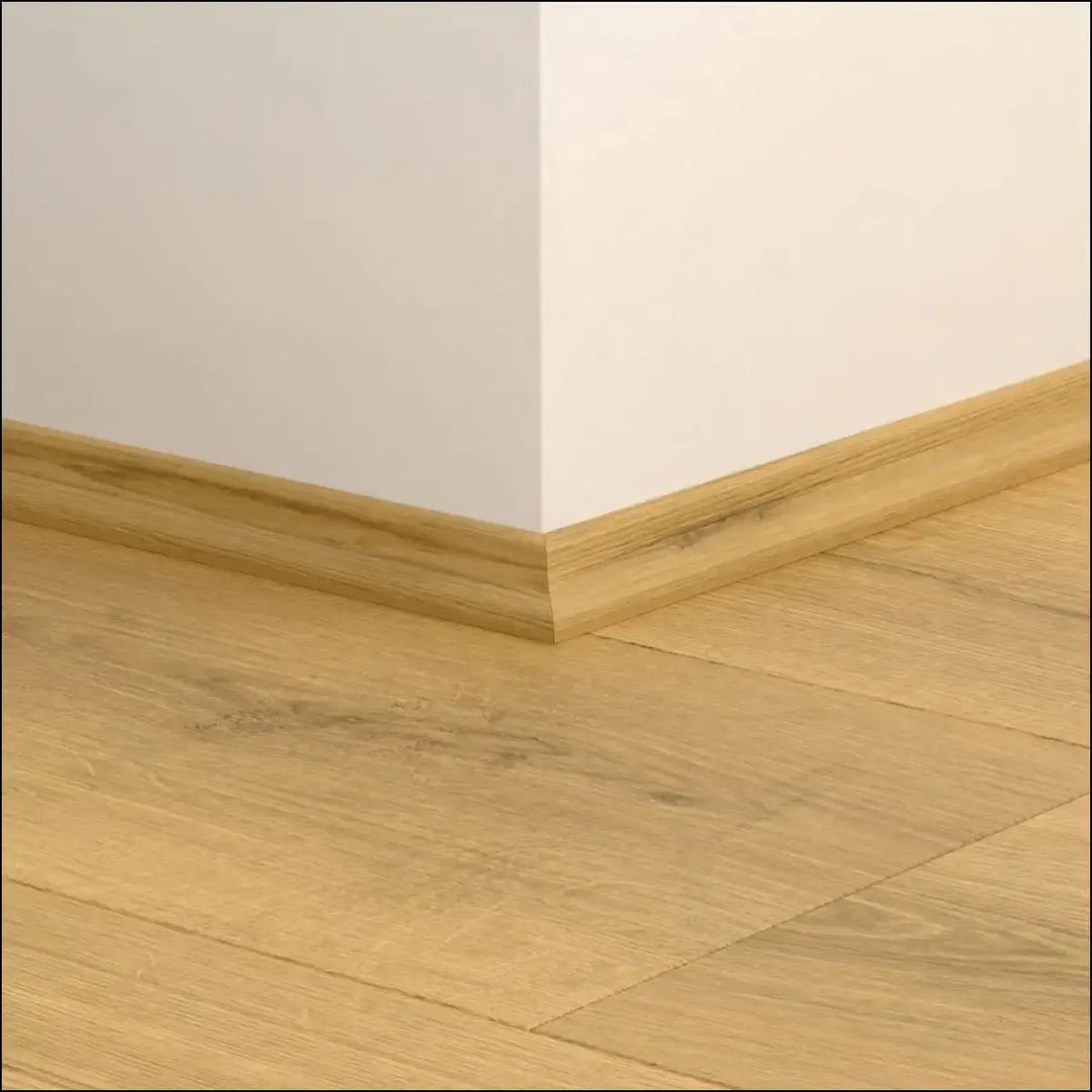 Light oak wooden baseboard with smooth natural grain finish quickstep classic scotia beading for quick-step flooring