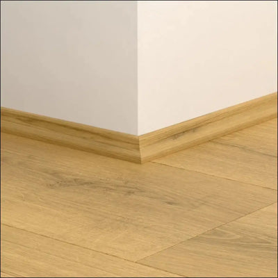 Light oak wooden baseboard with smooth natural grain finish quickstep classic scotia beading for quick-step flooring