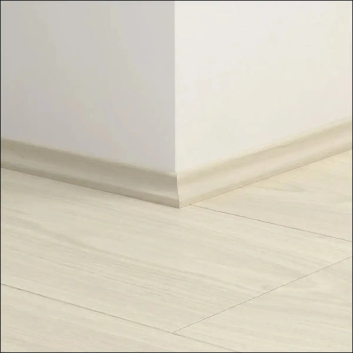 Beige wood effect baseboard with smooth rounded profile from quickstep classic scotia classic scotia beading system
