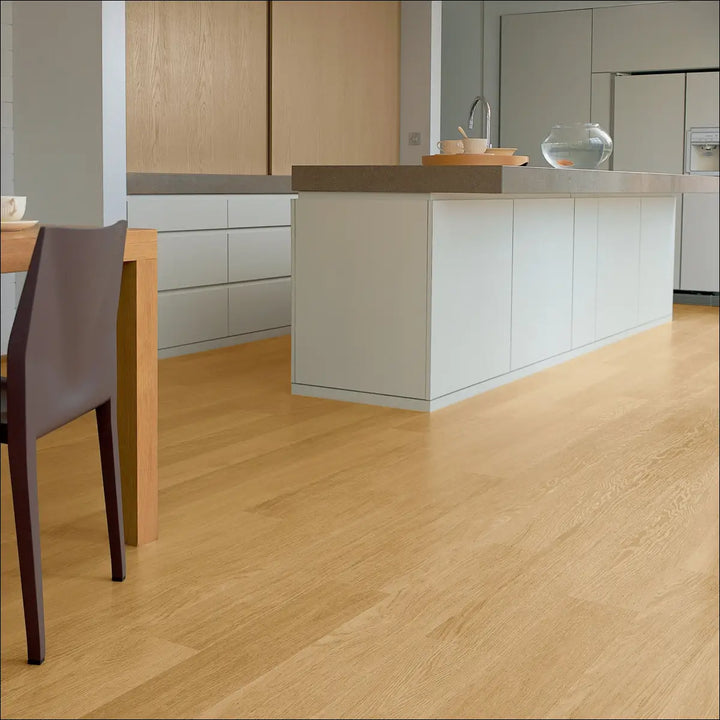 Quickstep eligna laminate flooring in natural varnished oak with smooth polished light oak hardwood finish interior