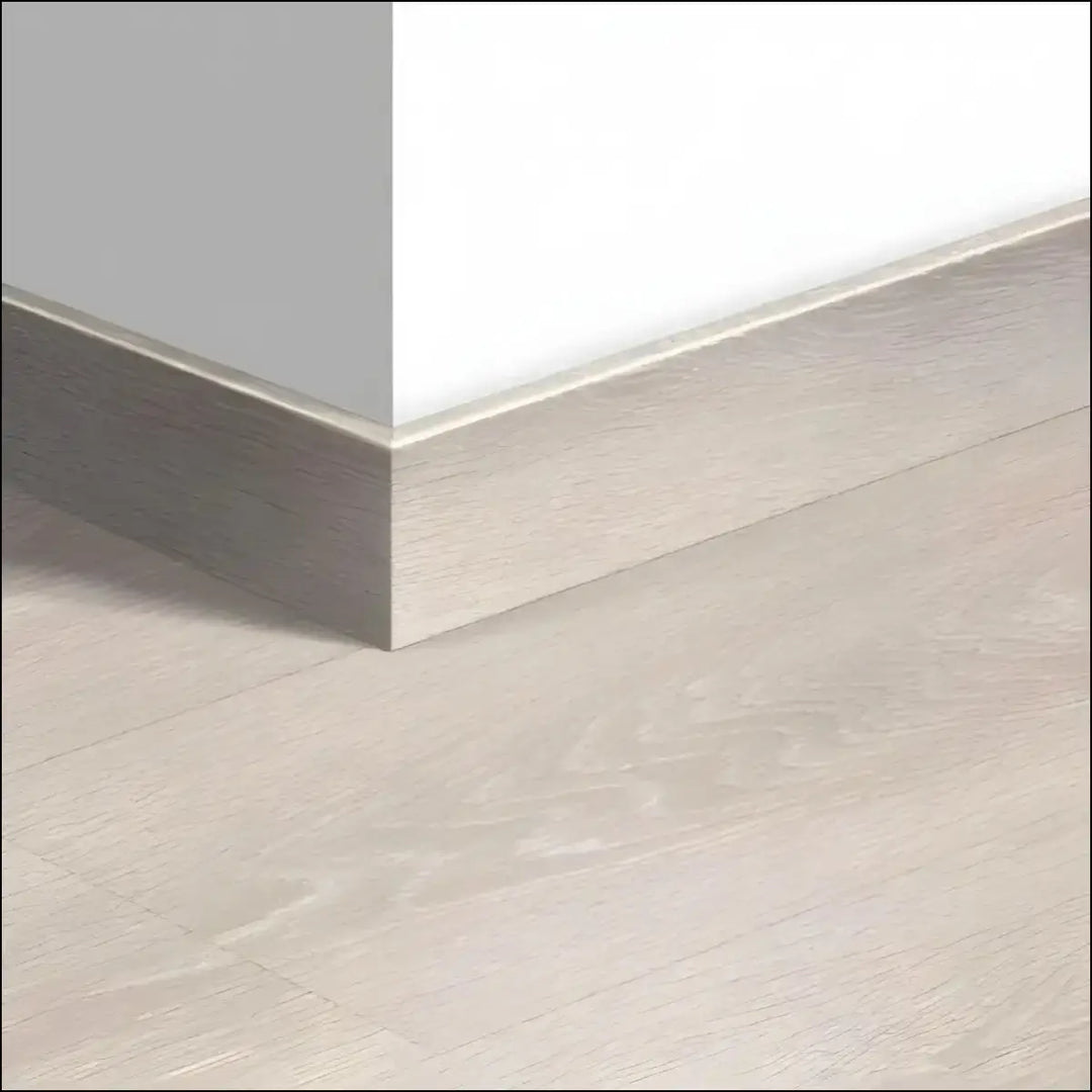 Light gray wood grain quickstep majestic skirting board with smooth modern finish for matching skirting boards