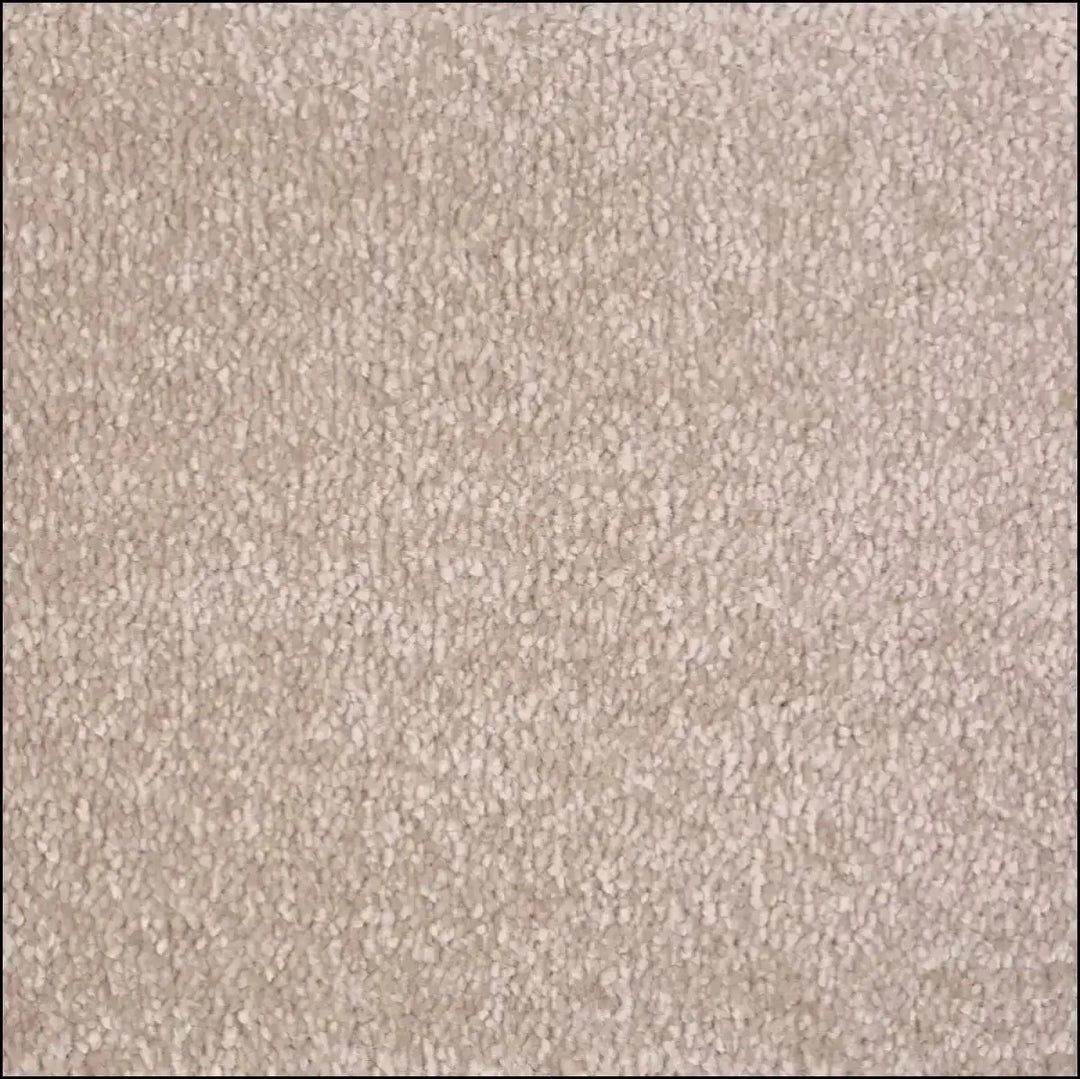 Beige soft touch saxony carpet with a plush 14mm pile perfect for cozy living spaces