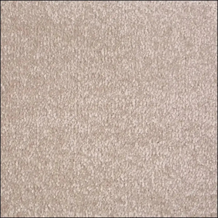 Beige soft touch saxony carpet with a plush 14mm pile perfect for cozy living spaces