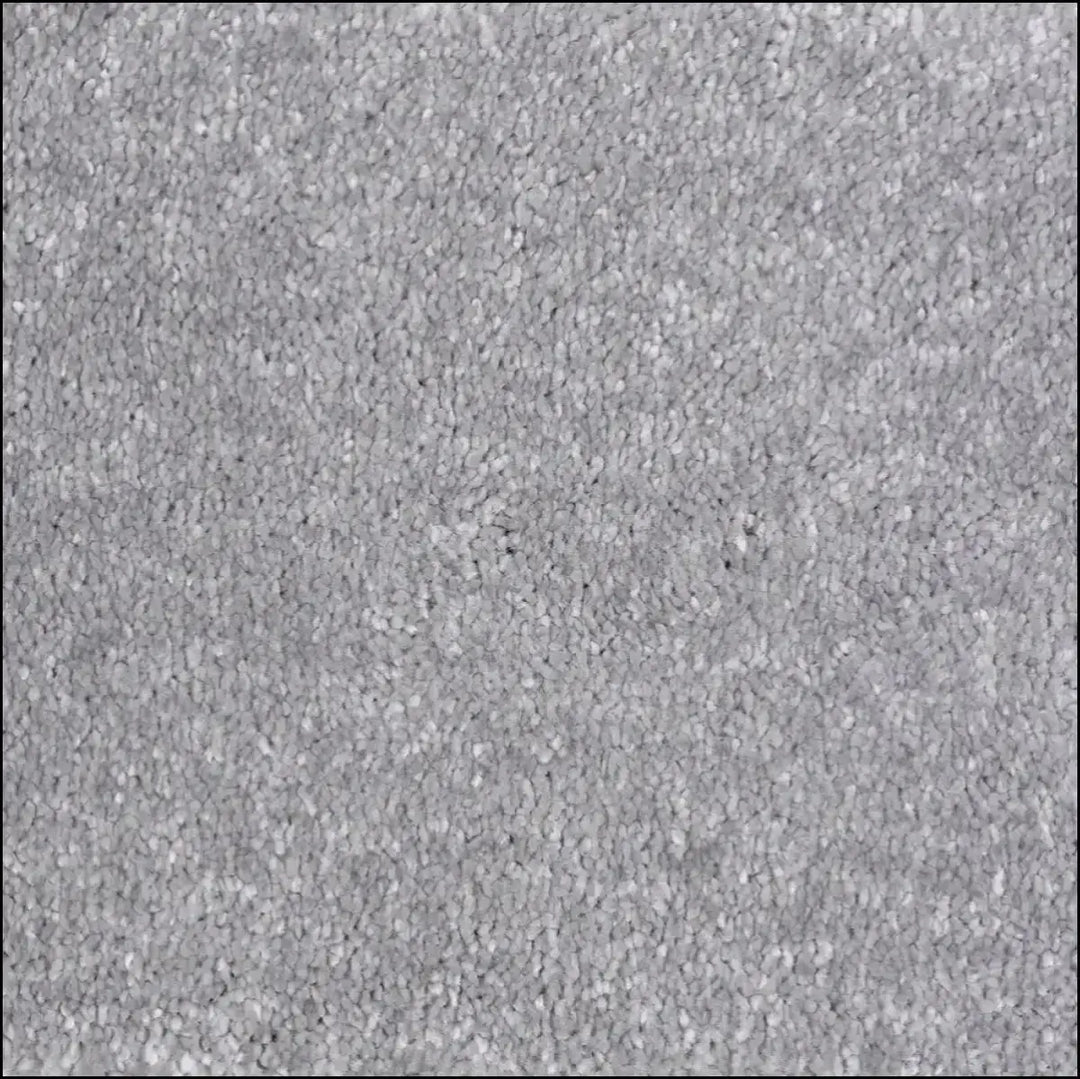 Gray textured carpet with uniform dense pile featuring a soft touch saxony 14mm pile for a cozy feel