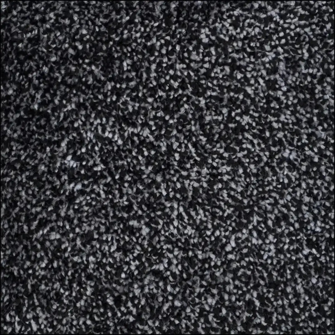 Soft supreme saxony carpet with black and white speckled texture offers a cozy touch saxony feel for any room