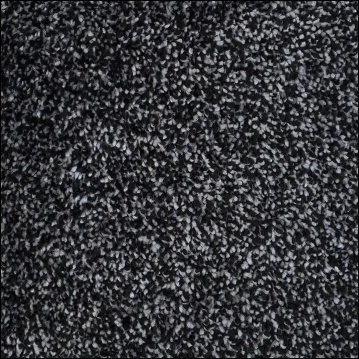 Soft supreme saxony carpet with black and white speckled texture offers a cozy touch saxony feel for any room