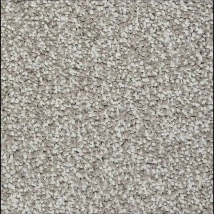 Beige supreme luxury saxony carpet with a dense pebbled surface and 14mm pile for plush comfort